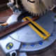 Cutting pieces of hardwood beading to the correct lengths.
