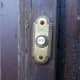 Original doorbell on the outer porch door