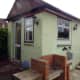 Garden shed lamps also matching house wall light.