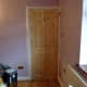 The new solid wood pine door fitted.