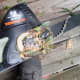 Debris gets pulled under the cover, clogging this part of the saw.