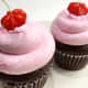 Chocolate cupcakes with Surinam cherry syrup whipped cream.