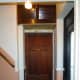 Remodelled meter cupboard after applying three coats of wood stain to the doors