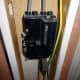 The main 100AMP 415v fuse to the house predominantly hidden by wooden boxing when the front panel is in place