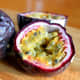 When passion fruit is ripe and ready to be eaten, it will look more like the ones in this photograph.