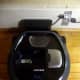 Samsung Powerbot R7040 robotic vacuum with dustbin removed.