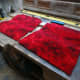 Cutting squares to fit from off cuts of an Axminster carpet used in one our bedrooms.