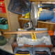 Cutting the wood to the correct length on a mitre saw.