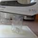 3. Gently press a warm iron to the cut edge. In a few seconds, the edge will bend under. Allow to cool.
