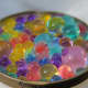 Kids can sort different shapes and colors of water beads.