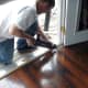 The hardwood floor needed to be slightly trimmed.  Such tasks are not unusual; be prepared for a little custom work.