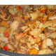minnesota-cooking-fried-potatoes-with-sauerkraut-and-bits-of-onion-and-pepper