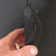 In the 2013 Razer switched to the non-slip side buttons. This is an upgrade that, for me, is worth its weight in gold. 