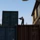 This upper green container makes a good spot to provide over-watch. You need to rely on other players to watch your back.