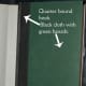 Example of quarter-bound book. Cloth is in black and boards are green. (graphic by AMB)