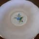 The saucer showing the forget-me-not design underneath.
