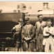 Loco cleaners pose on an engine at Caerphilly, Wales