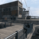 The maintenance warehouse/boathouse at the Marina where some missions take place. Of course conveniently peppered with CCTV cameras that can be hacked.