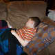 At home on the couch, three hours after surgery was performed.