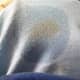 I used my sanitizer to moisten the stain. Who knows if it'll come out when I wash this shirt, but it's worth a try to keep it from setting.