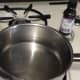 Heat a pot of water and add lavender oil.