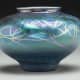 Between 1903 and 1932, Steuben produced colored glass, such as this iridescent Tyrian bowl from 1916.