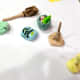 Our game pieces are all magic-themed: a snake, a broom, a book, a cauldron, a wand, and a lightning bolt.