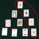 Four of a kind pattern with four aces. The player would place new cards over these aces. If the player is batting, they score an extra six runs. If the player is bowling, they take a wicket.