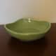 This is a Hall China candy dish.