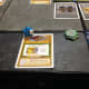 This meeple holds a legendary tome.