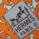 Look at the twill direction. It is not running 11 to 5. It is more East-to-West than a genuine Hermès tie.