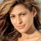 Eva Mendes with golden, sandy blonde hair.