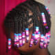 Another view of braided hair with beads.