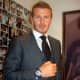 Beckham in another Jacob & Co. watch, this with a round face.