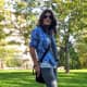 A casual and cool vibrant flannel with a striped undershirt.