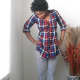 Bold, striped pants and a flannel top.