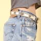 #6 white concho belt with faded blue jean shorts