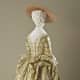 Polonaise style, circa 1775: shorter hemline and drawn-up over-dress.