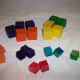 One-inch cubes and half-inch cubes sorted by color