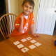 My son making a match in coin memory!