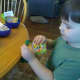 My son deciding on a pack of gummies for a quarter at the candy store.