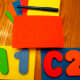 Use stencils to draw the letters and numbers.