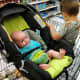 The baby can ride directly in the hammock, or by hooking the carseat into the hammock. This allows for more room in the cart for both kids, as well as groceries!