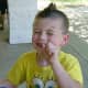 Wyatt eating beef jerky on his 7th birthday. Notice the rug burn on his forehead? This is from headbutting the floor while being restrained at his special school for emotionally disturbed children.
