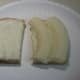 Banana sandwich on Oroweat Oatnut bread, slathered with Duke's mayo