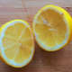 Chop a lemon in half and squeeze out the juice.