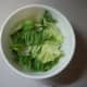 Add lettuce to bowl.