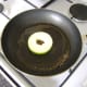 Glaze the apple ring in honey and sage.