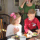 Cousins making a cake train