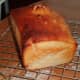 Loaf with cross cut in the center.
